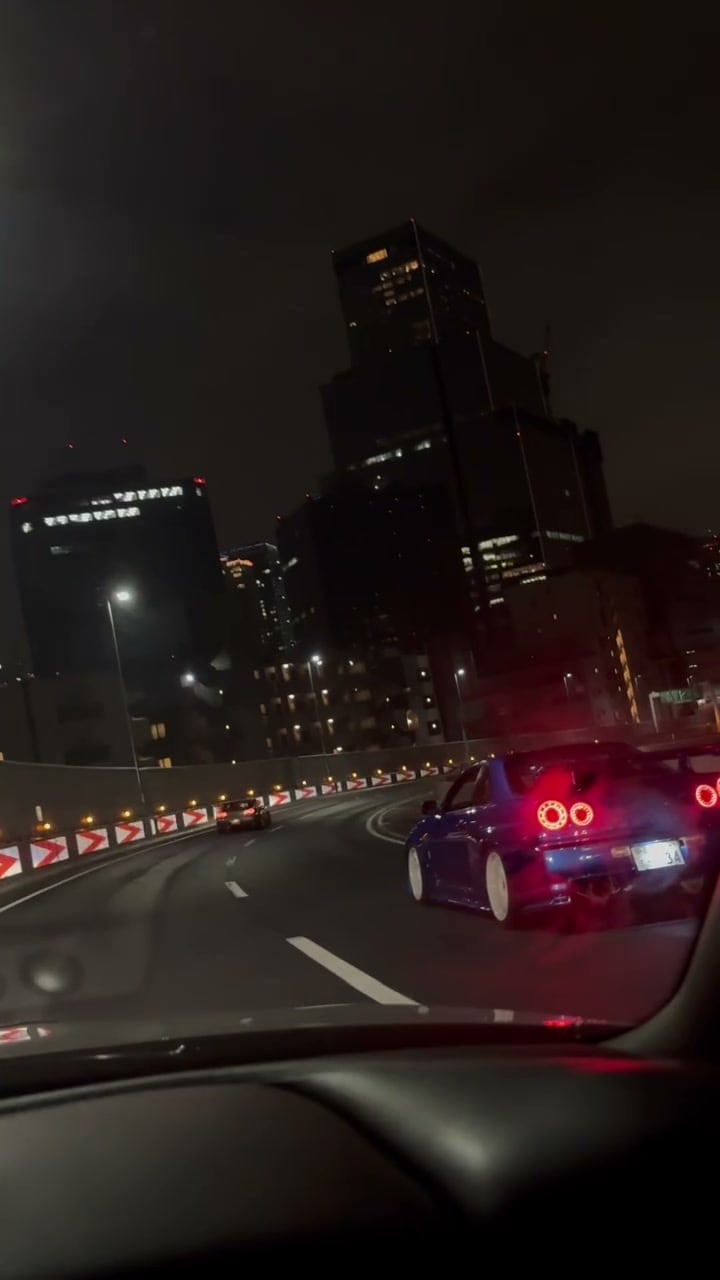 Nissan Skyline GT-R driving on a Tokyo expressway