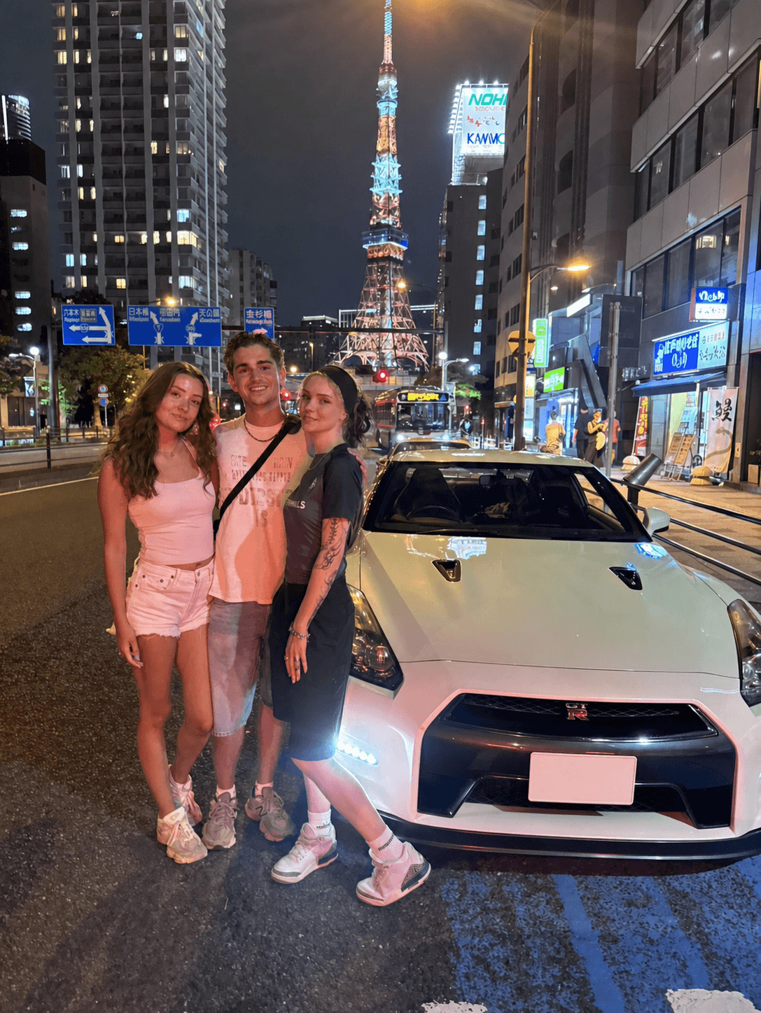 Three guests with a Nissan GT-R R35 near Tokyo Tower