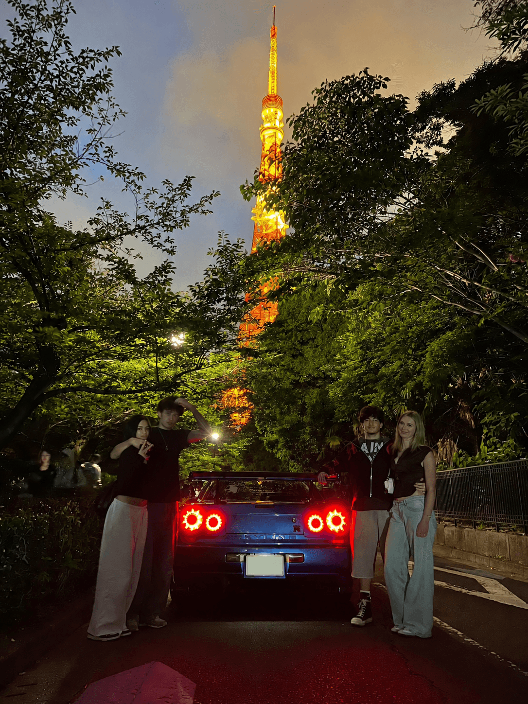 Guests with a Nissan Skyline GT-R R34 in Tokyo